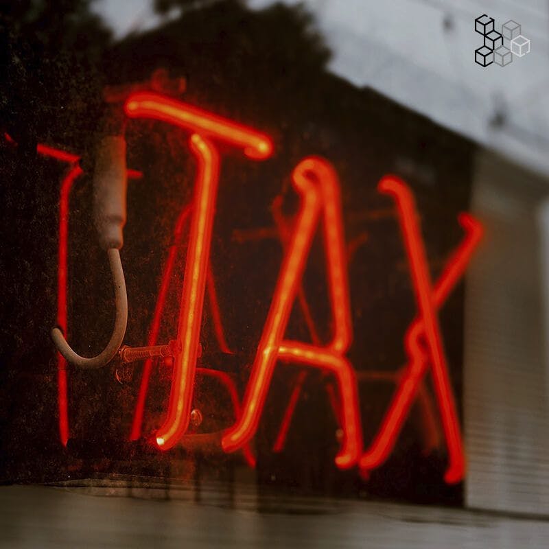 Lámpara de neón con la palabra Tax
